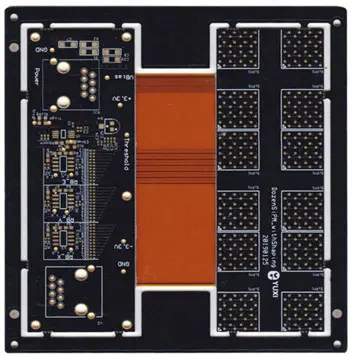 Shenzhen Hongda Circuit Technology Rigid-Flex PCB showing a black rigid circuit board connected by an orange flexible printed circuit strip with gold-plated pads.